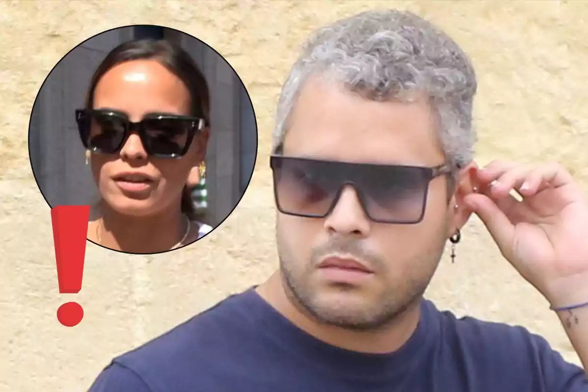 José Fernando con gafas de sol y cabello corto y canoso en primer plano, con Gloria Camila también con gafas de sol en un círculo en la esquina superior izquierda y un signo de exclamación rojo junto a ella
