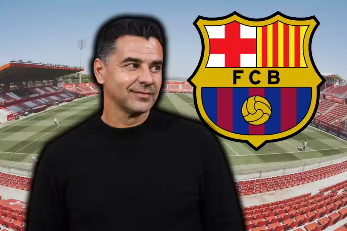 Hombre de cabello oscuro con suéter negro frente a un estadio de fútbol y el escudo del FC Barcelona
