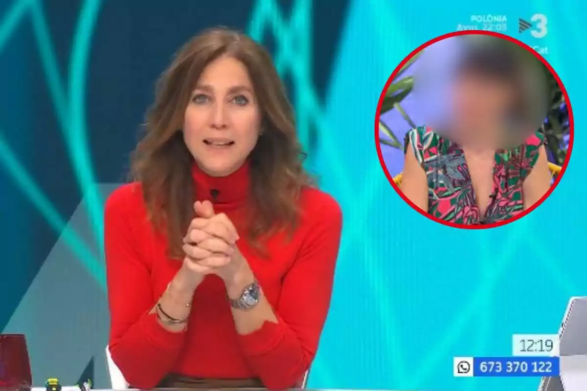 TV host in a red sweater speaking on a live show with a box showing another blurred person in the background and information graphics on screen.