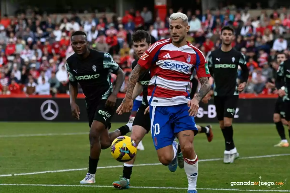 Stoichkov en un partit amb el Granada Stoichkov en un partit amb el Granada