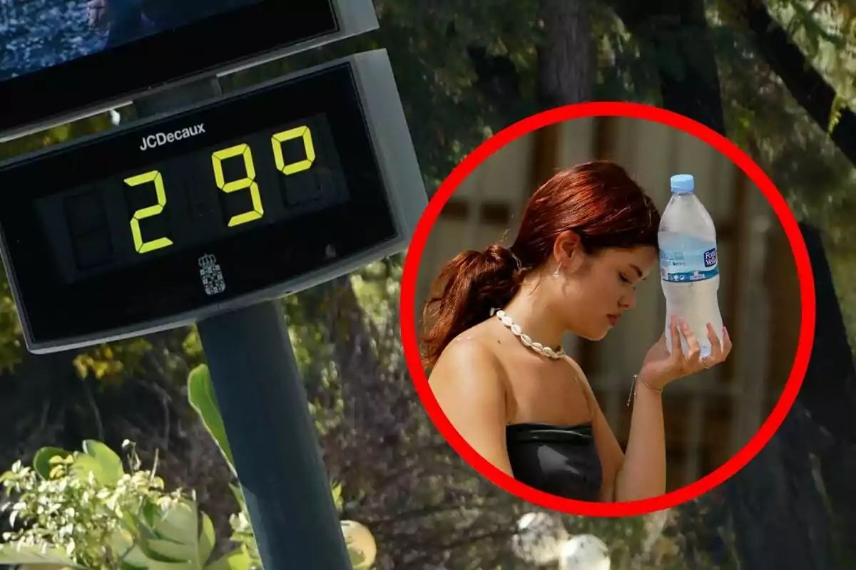 Un termómetro en la calle marca 29 grados mientras una mujer se refresca con una botella de agua en la frente Un termómetro en la calle marca 29 grados mientras una mujer se refresca con una botella de agua en la frente