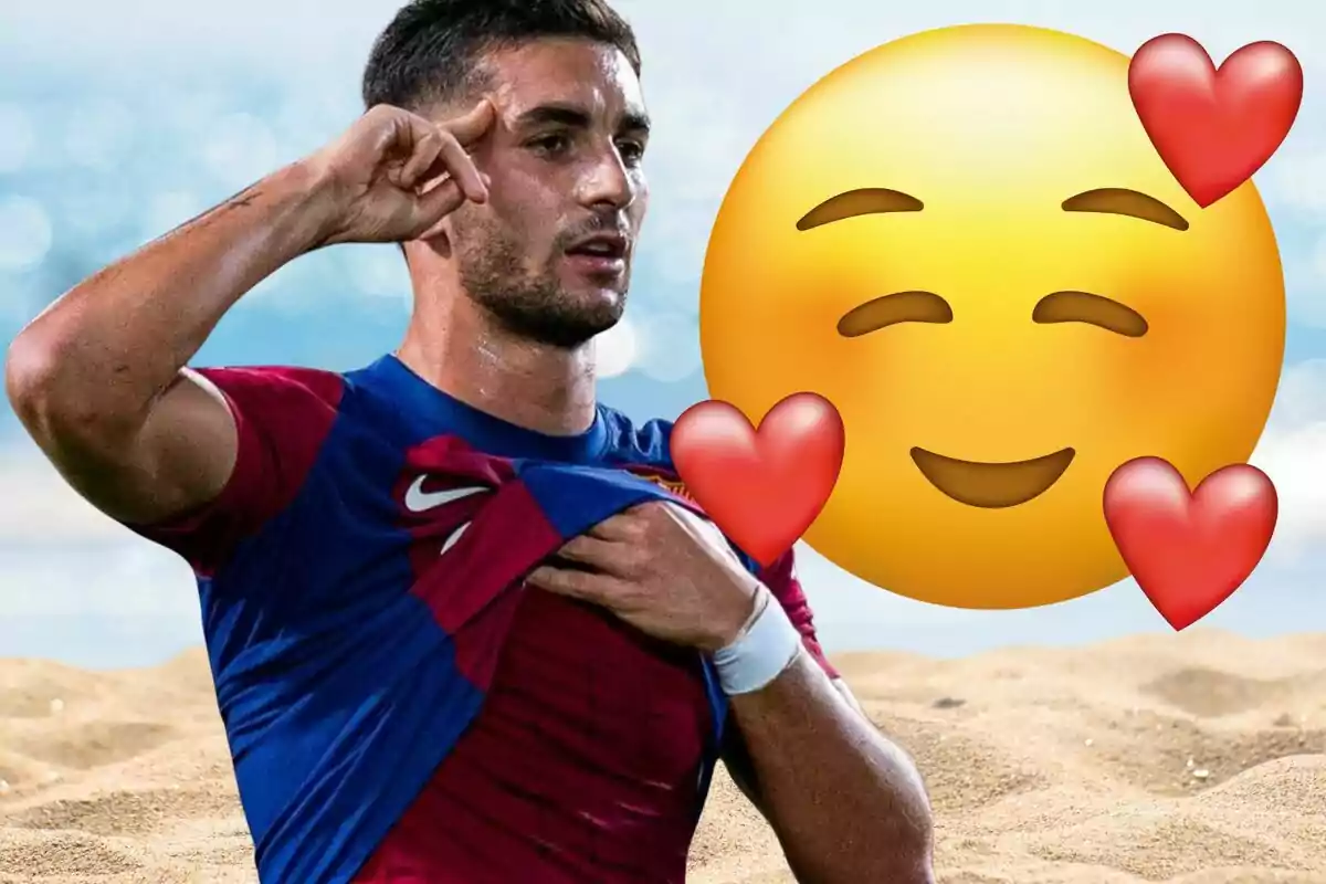 Soccer player celebrating with a hand on his forehead and a blue and red jersey while a smiling emoji with hearts appears in the background over a sandy landscape