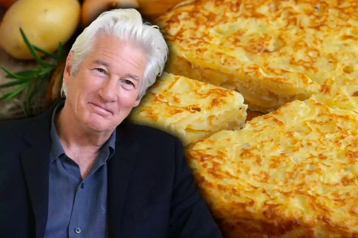 Smiling gray-haired man in front of a Spanish omelette Smiling gray-haired man in front of a Spanish omelette