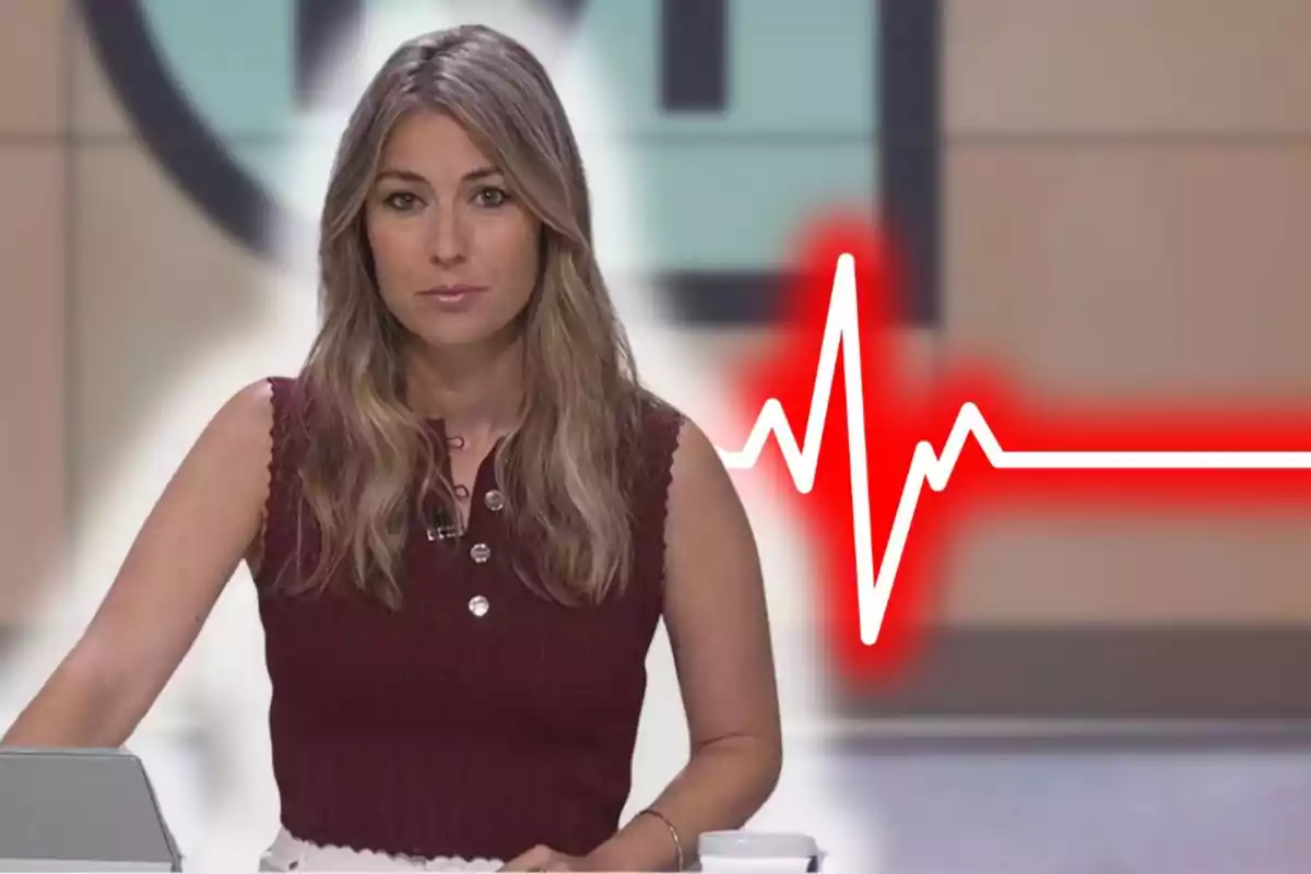 Dona presentadora de notícies amb un gràfic de línia de pols cardíac de color vermell al seu costat