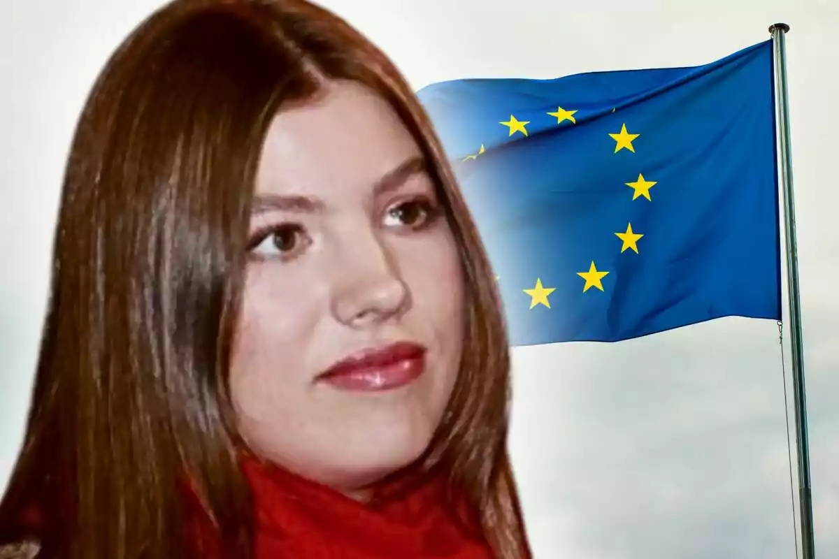 La infanta Sofia amb rostre seriós en primer pla i la bandera de la Unió Europea onejant al fons.