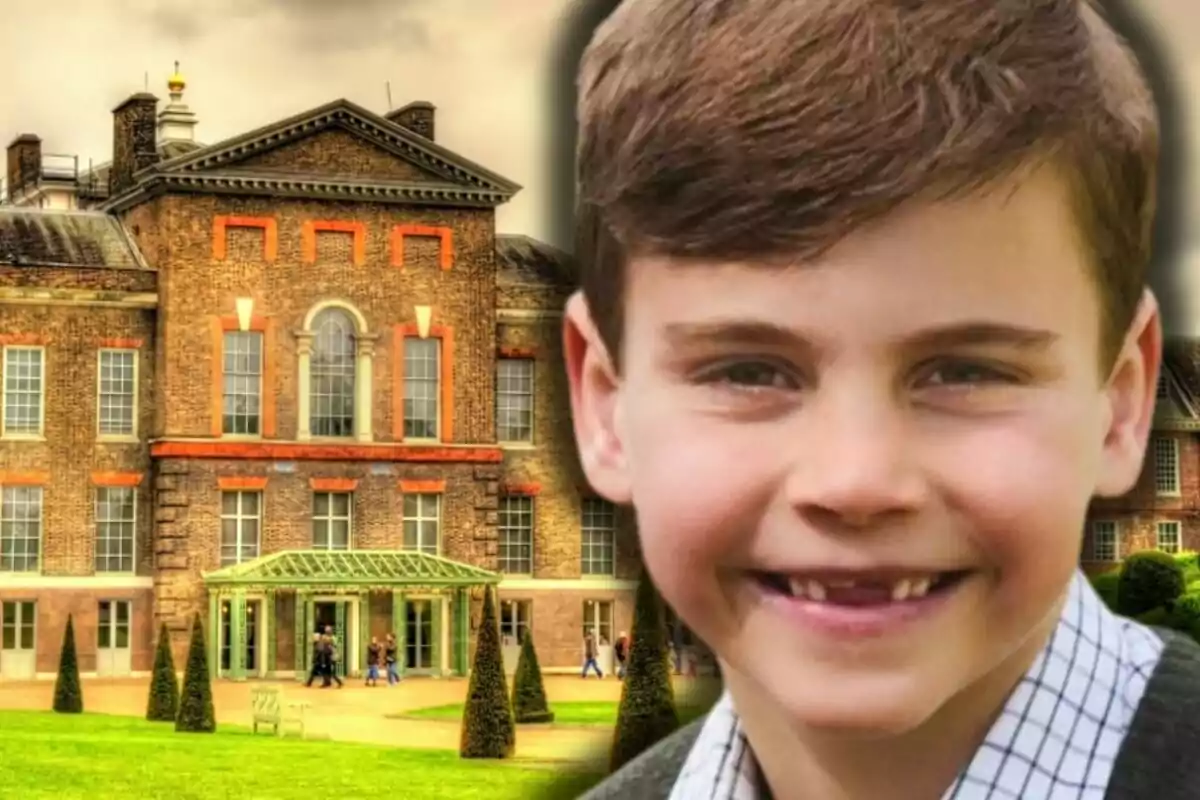 Prince Louis smiling in the foreground with an old brick building in the background