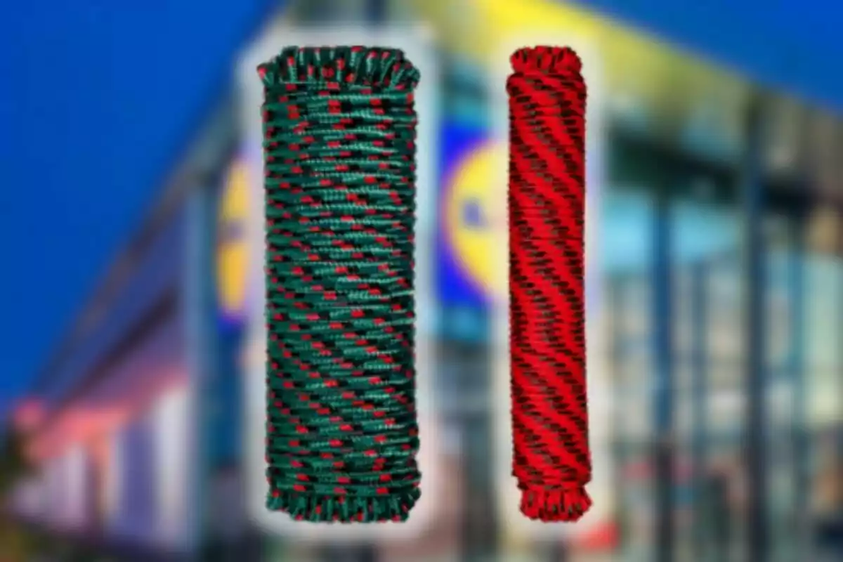 Two rolls of red and green colored rope with a blurred building background Two rolls of red and green colored rope with a blurred building background