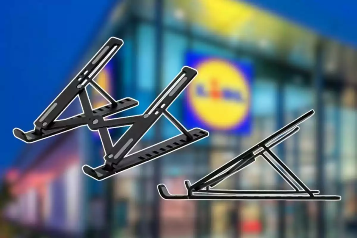 Adjustable black laptop stands with a blurred Lidl store in the background Adjustable black laptop stands with a blurred Lidl store in the background