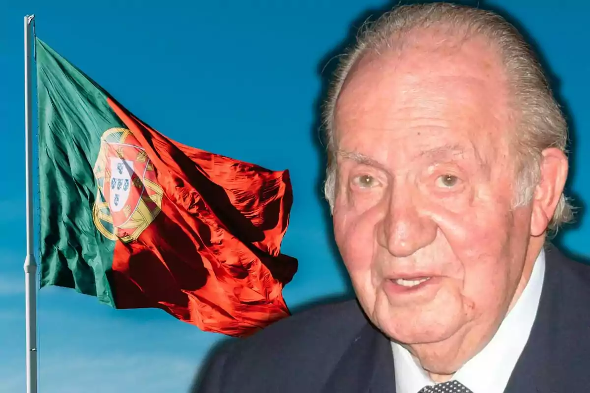 Juan Carlos I in the foreground with a Portuguese flag waving in the background against a blue sky