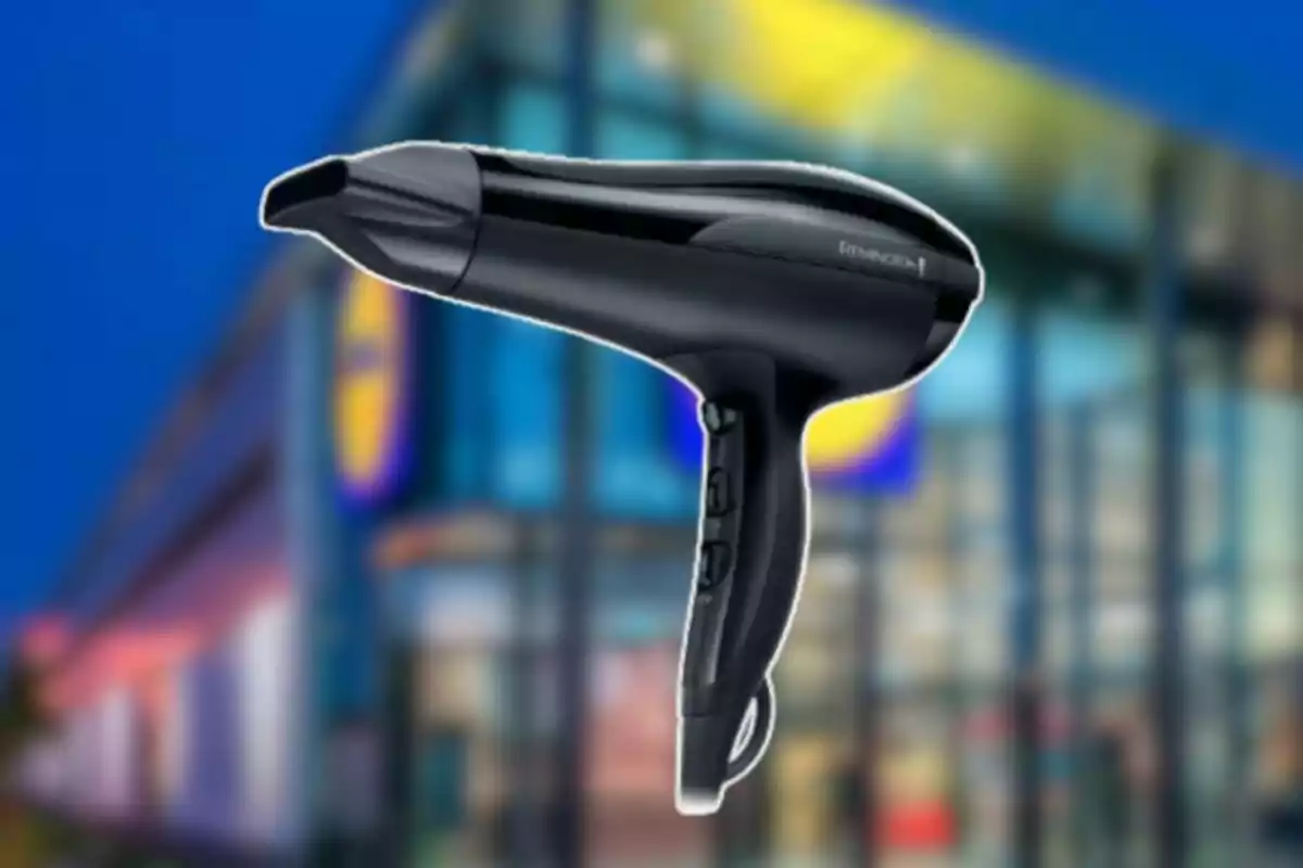 Black hair dryer against a blurred store background Black hair dryer against a blurred store background