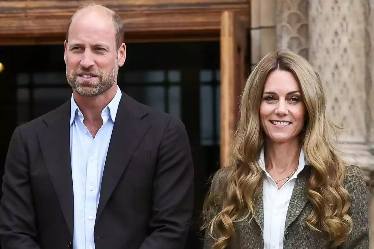 A man and a woman standing together outdoors, both dressed formally and smiling. A man and a woman standing together outdoors, both dressed formally and smiling.