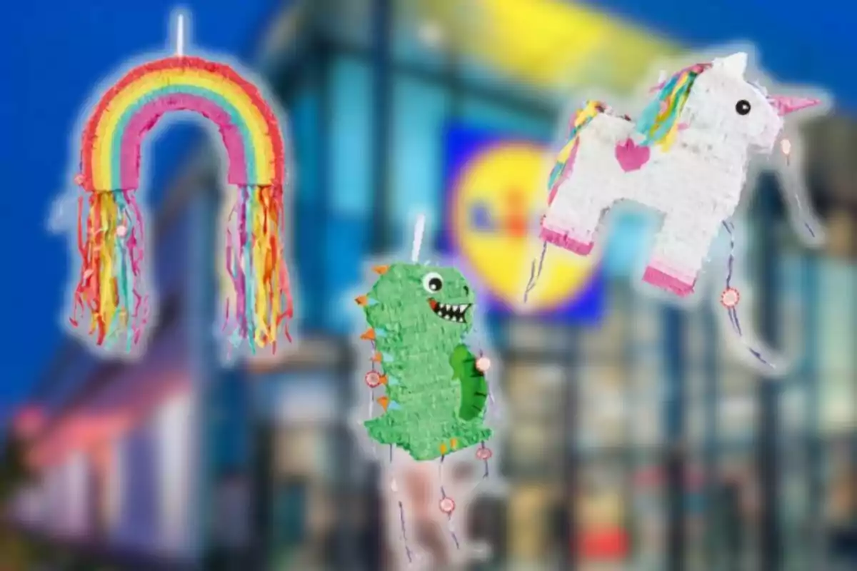 Three colorful piñatas shaped like a rainbow, a dinosaur, and a unicorn are hanging in front of a blurred building. Three colorful piñatas shaped like a rainbow, a dinosaur, and a unicorn are hanging in front of a blurred building.