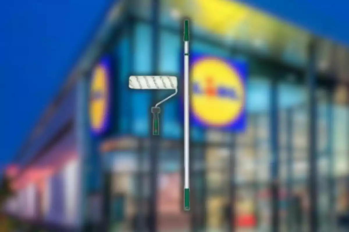 A paint roller with an extended handle appears in front of the blurred facade of a supermarket. A paint roller with an extended handle appears in front of the blurred facade of a supermarket.