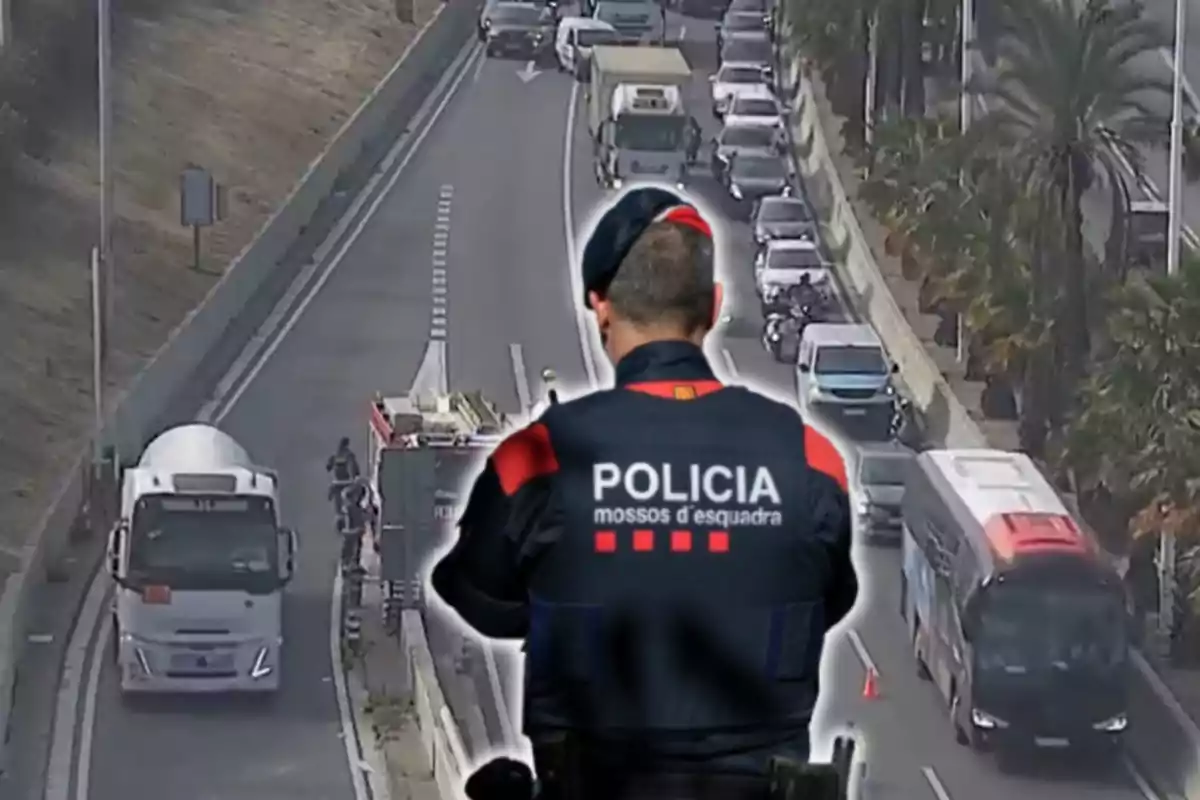 Un agent dels Mossos i caravana a la B-10