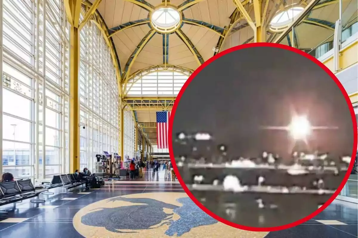 Interior d'un aeroport amb un sostre alt i finestres grans, on s'observa una bandera dels Estats Units penjant, i un cercle vermell que destaca una imatge borrosa d'un objecte brillant al cel nocturn.