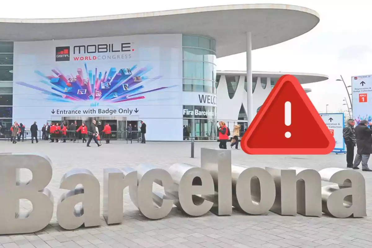 Entrada al Mobile World Congress a Barcelona amb un símbol d'advertència