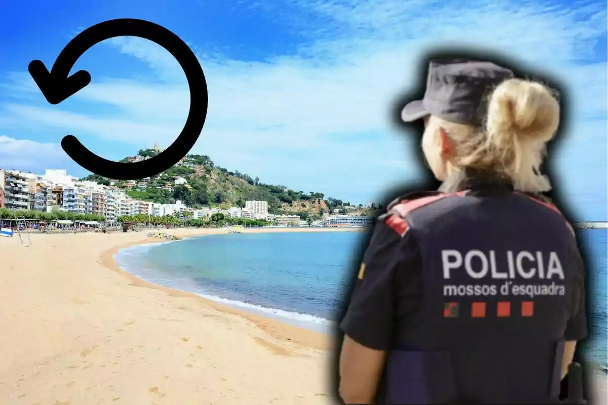 Una agente de policía de espaldas con uniforme de los Mossos d'Esquadra observa una playa con edificios al fondo y un símbolo de flecha circular negra en la esquina superior izquierda.