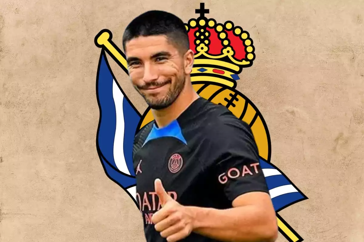 Carlos Soler i l'escut de la Reial Societat