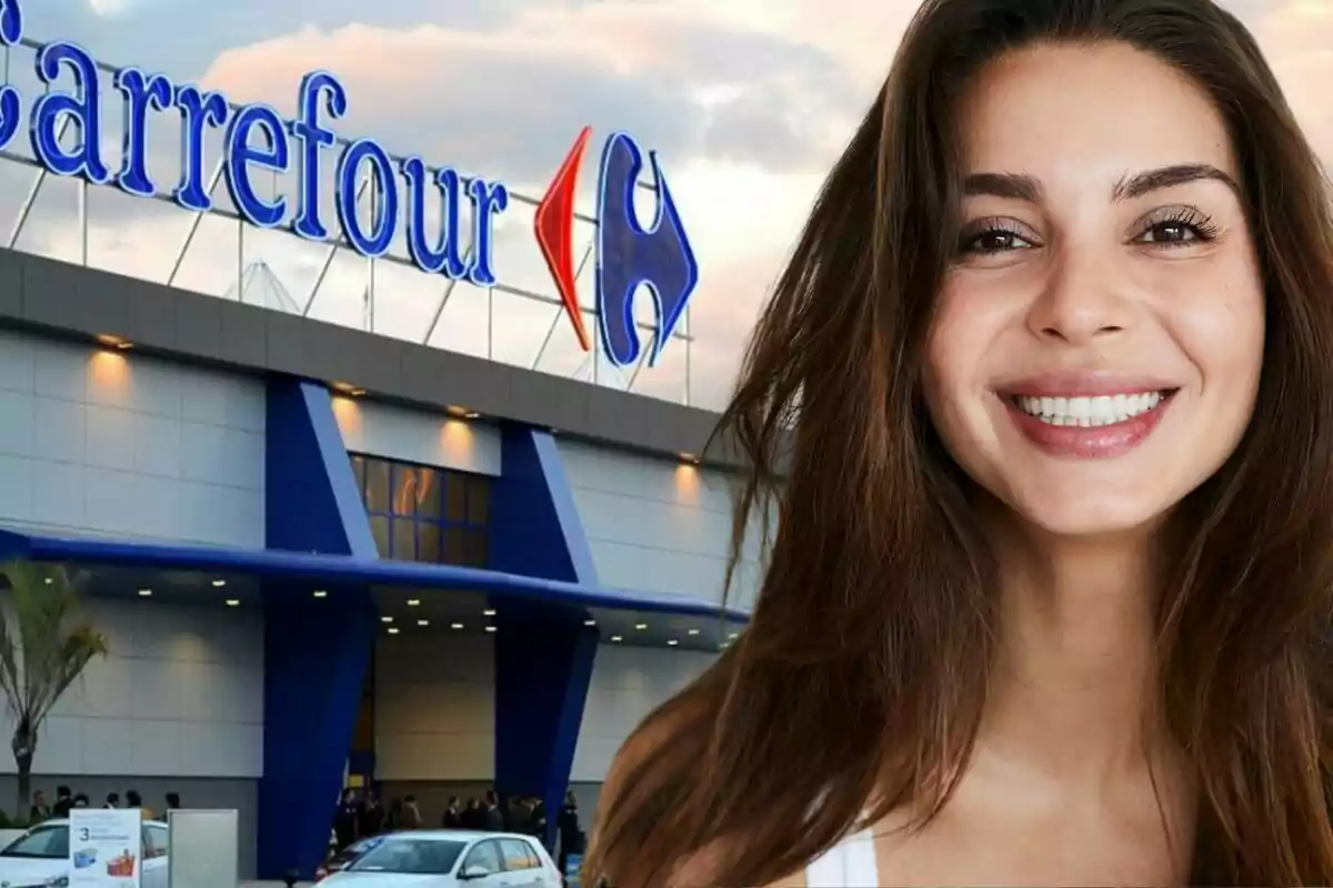 Una dona somrient davant d'un edifici de Carrefour.