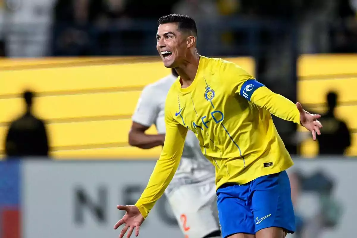 Cristiano Ronaldo celebrating a goal in a yellow and blue uniform in a stadium. Cristiano Ronaldo celebrating a goal in a yellow and blue uniform in a stadium.