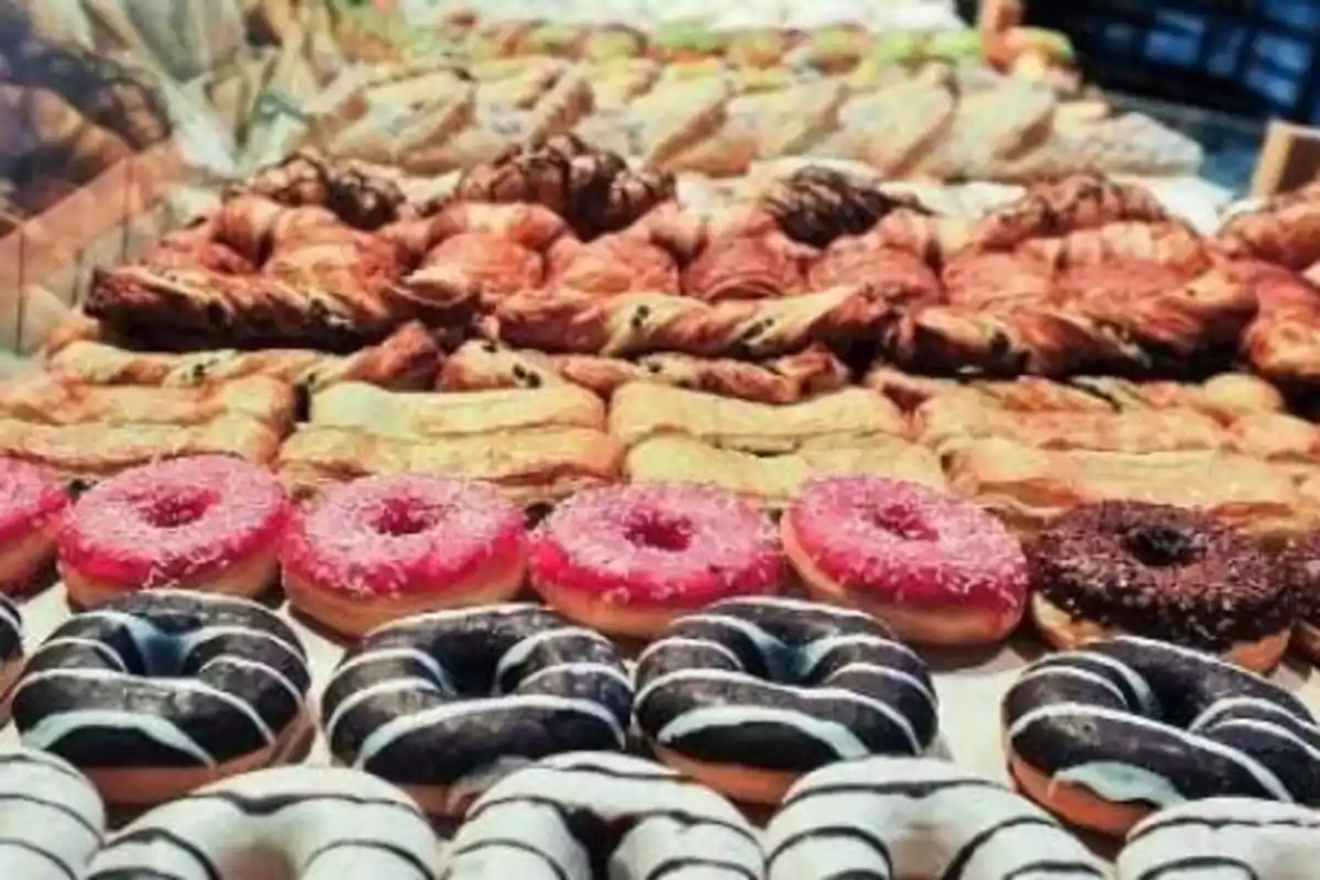 A variety of cakes, pastries and cookies are on display in the oven.