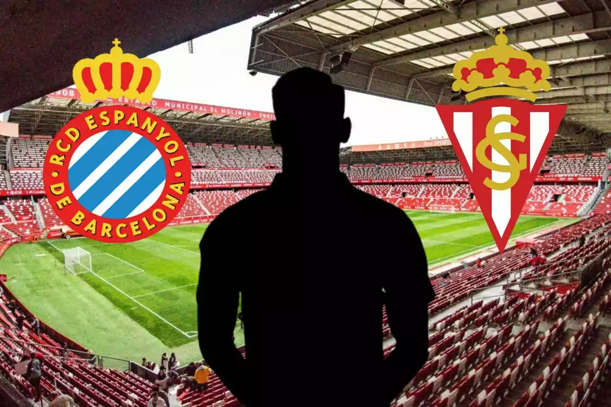 Una silueta d?una persona en un estadi de futbol amb els escuts del RCD Espanyol de Barcelona i l?Sporting de Gijón.