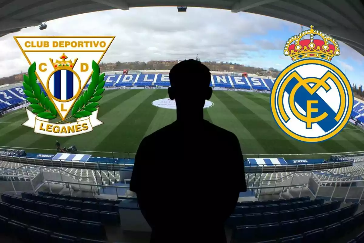 Una silueta de una persona en un estadio de fútbol con los escudos del Club Deportivo Leganés y el Real Madrid.