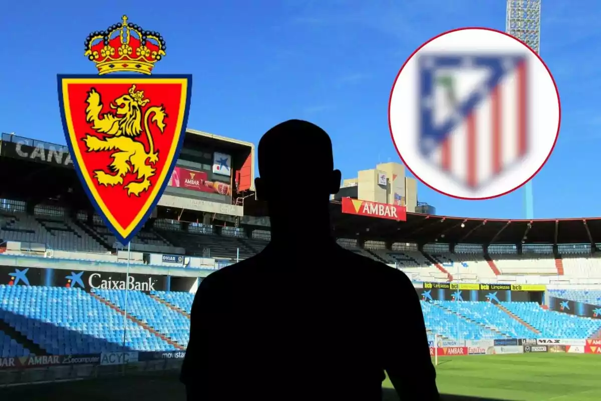 Una silueta de una persona en un estadio de fútbol con los escudos del Real Zaragoza y otro equipo difuminado.