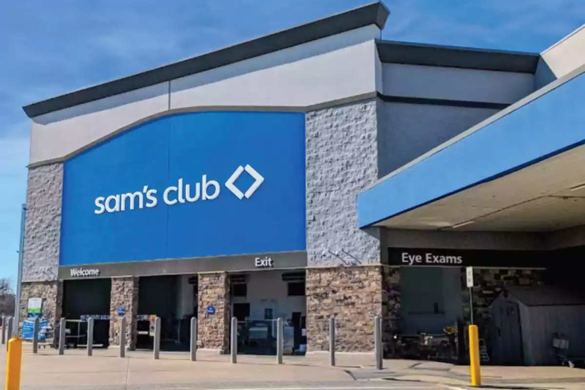 Facade of a Sam's Club store with a large blue sign at the main entrance. Facade of a Sam's Club store with a large blue sign at the main entrance.