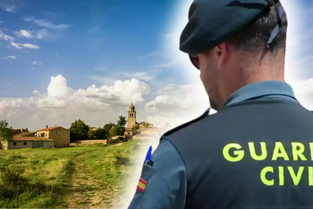 Un agente de la Guardia Civil de espaldas con un paisaje rural al fondo.