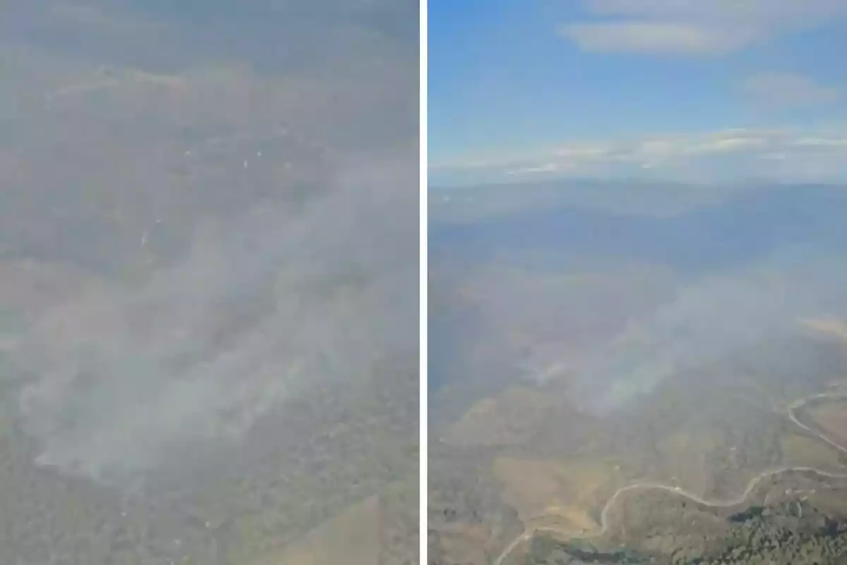 Imagen aérea de un incendio forestal en una zona montañosa con humo visible y un cielo parcialmente despejado.