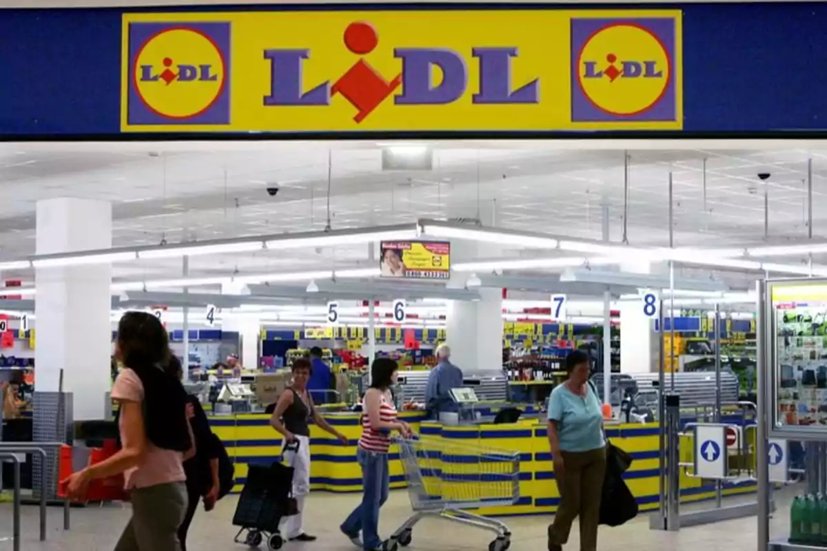 People shopping at Lidl supermarket.