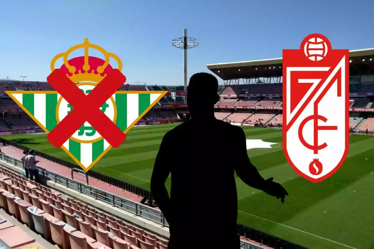 Una silueta d?una persona en un estadi de futbol amb els escuts del Real Betis i el Granada CF, on l?escut del Real Betis té una creu vermella a sobre.