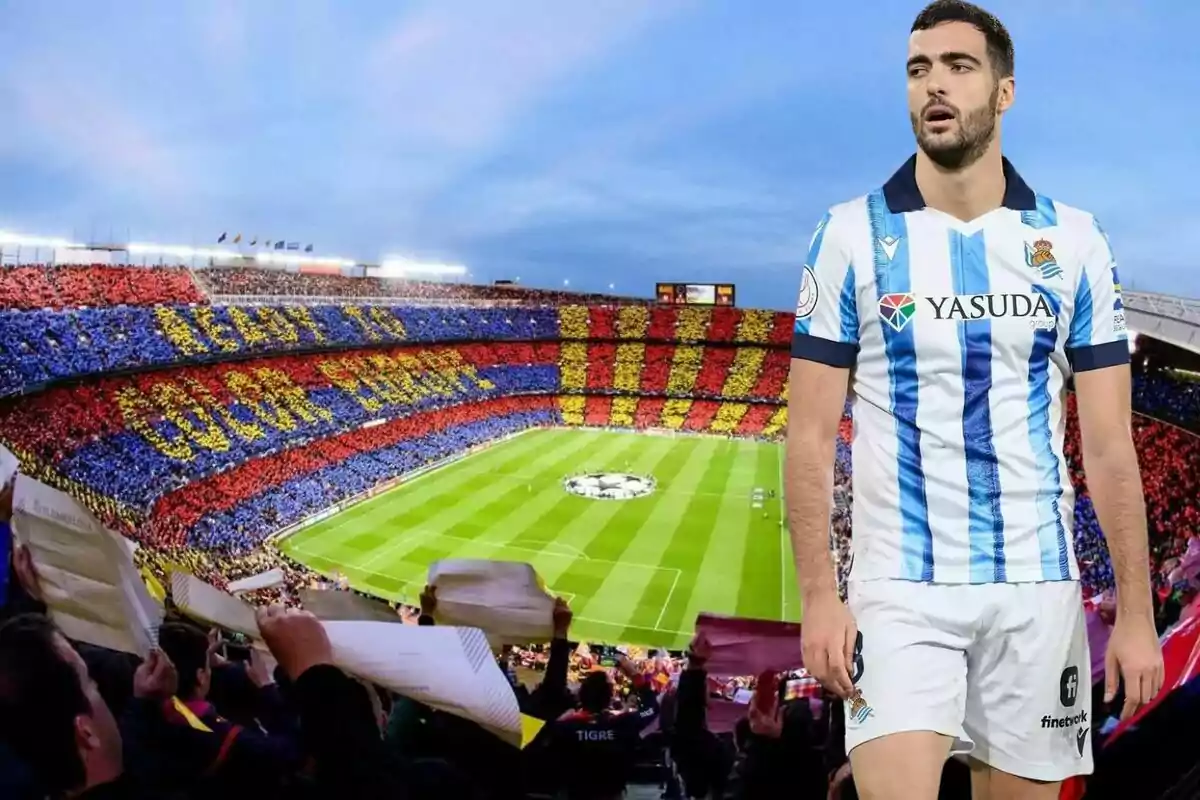 Un jugador de fútbol con el uniforme de la Real Sociedad está superpuesto sobre una imagen de un estadio lleno de aficionados con un mosaico de colores rojo, azul y amarillo.