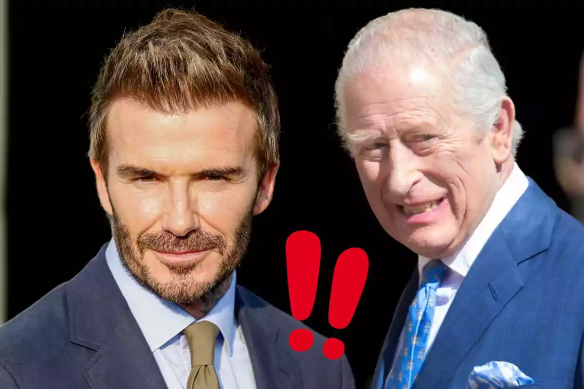 David Beckham i Carlos III vestits amb vestit posen junts amb dos signes d’exclamació vermells entre ells.