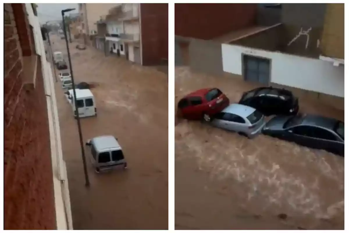 Calle inundada con varios coches parcialmente sumergidos en el agua.