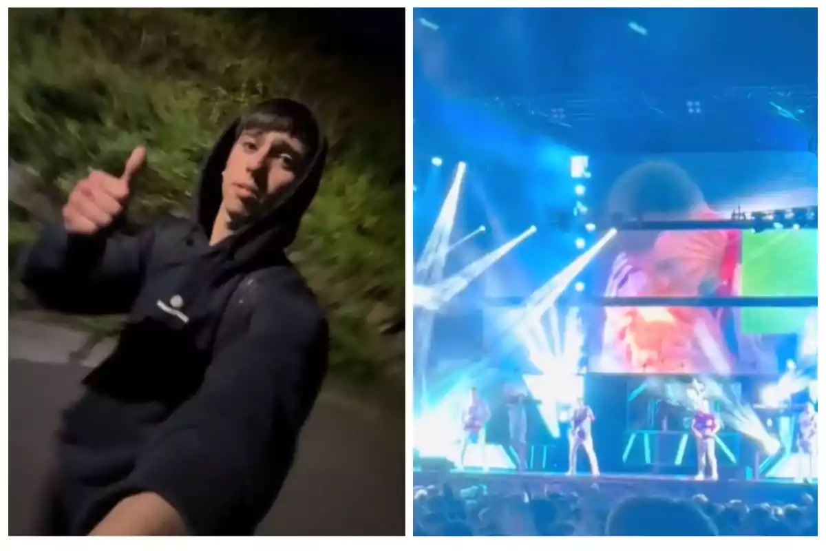 Un joven con sudadera negra hace un gesto de aprobación con el pulgar mientras camina de noche y a la derecha se observa un concierto con luces brillantes y una pantalla grande mostrando imágenes.