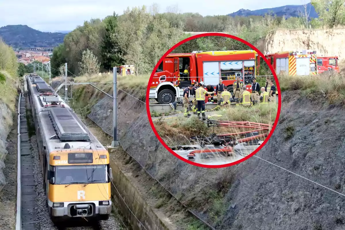 Un tren detingut a les vies amb un grup de bombers i vehicles d?emergència treballant en una àrea propera.