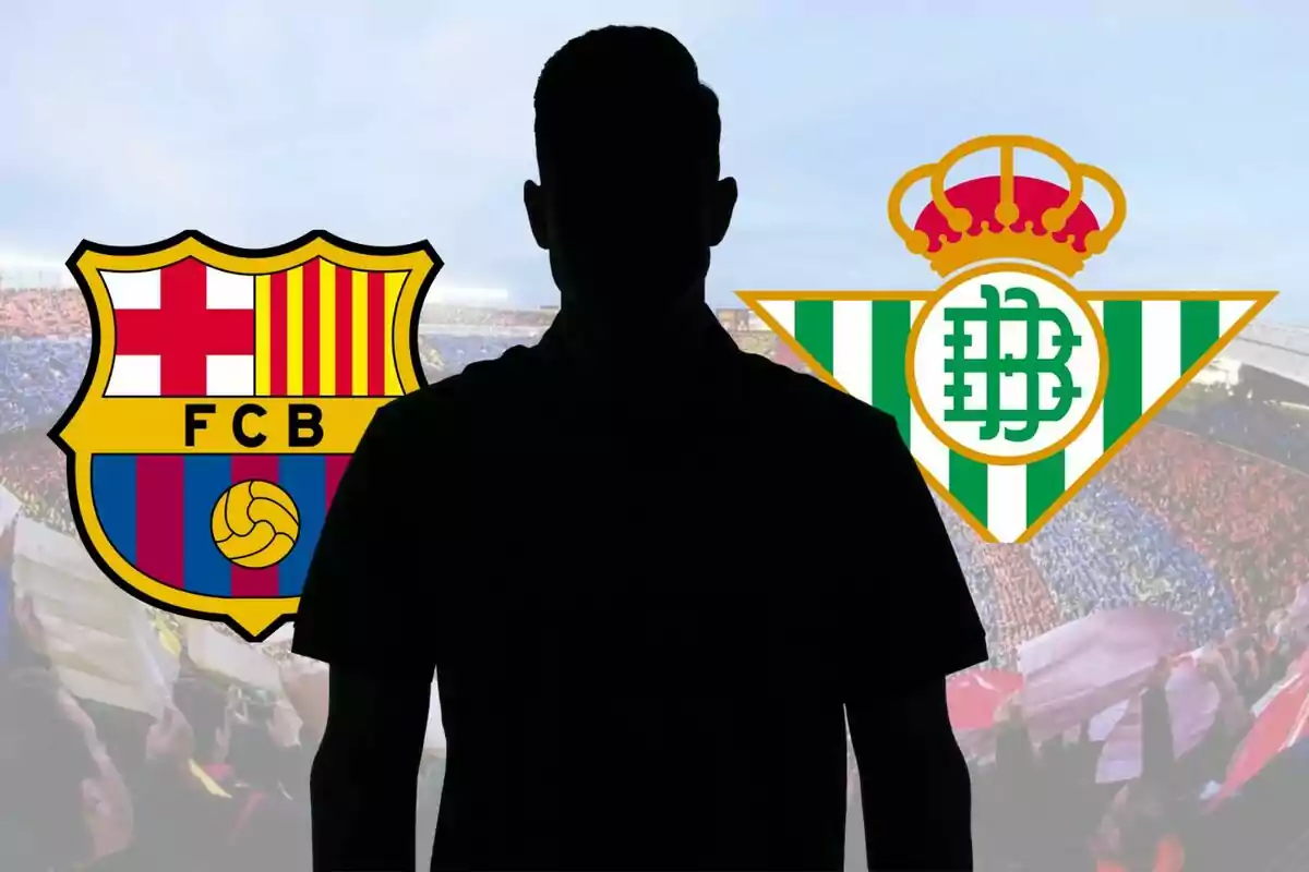 Silueta de una persona entre los escudos del FC Barcelona y el Real Betis en un estadio de fútbol.