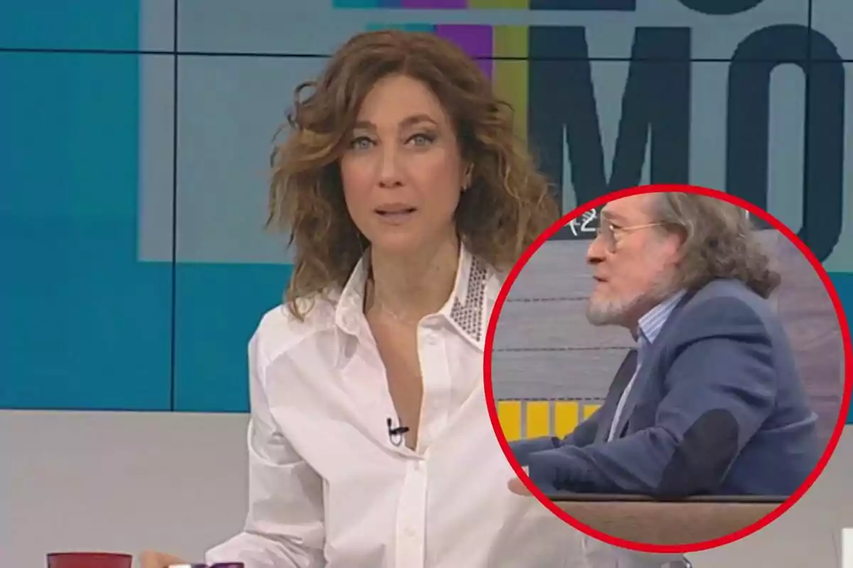 Una presentadora de televisió amb cabell arrissat i una camisa blanca apareix en un estudi, mentre que en un cercle vermell es mostra un home gran amb barba i ulleres, vestint un vestit blau.