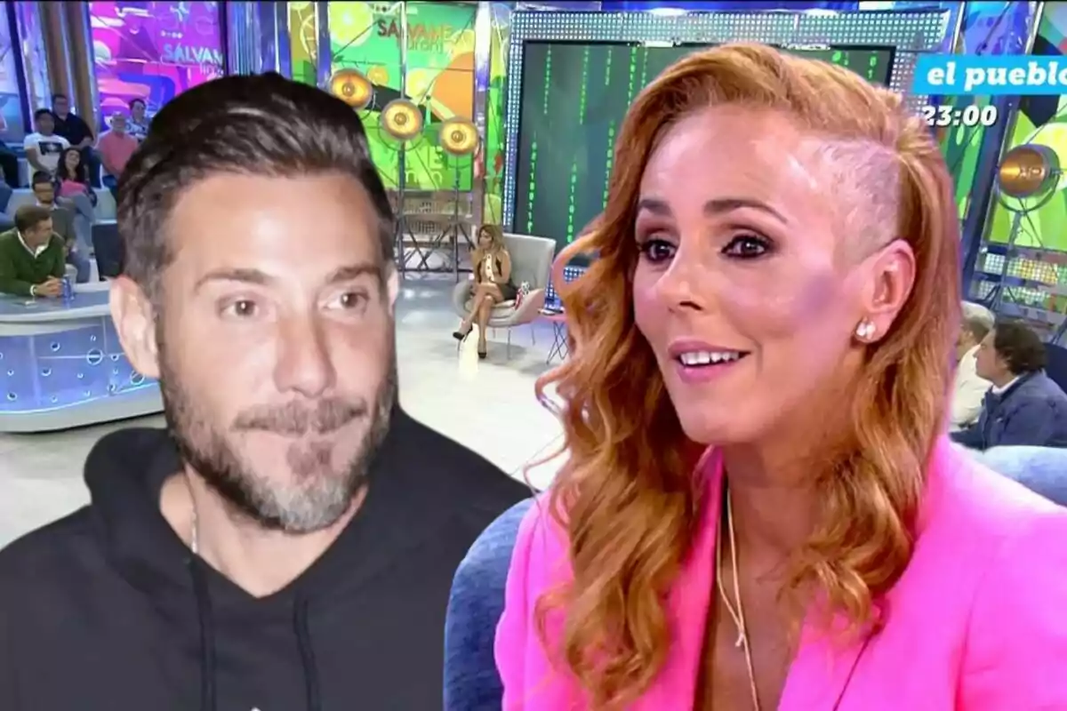 Un home amb barba i una dona amb els cabells pèl-rojos i rapats a un costat apareixen en un plató de televisió colorit amb públic i presentadors al fons.