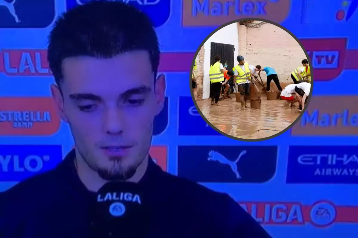 Un jugador de fútbol da una entrevista después de un partido de LaLiga mientras en un recuadro se muestra a un grupo de personas trabajando en una zona inundada.