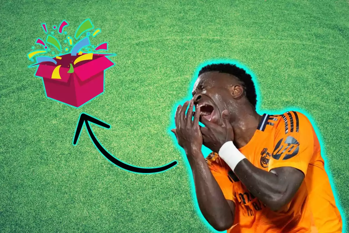 Un jugador de fútbol con uniforme naranja parece estar gritando o celebrando, mientras una caja de regalo con confeti sale de un lado, conectada por una flecha negra sobre un fondo de césped verde.