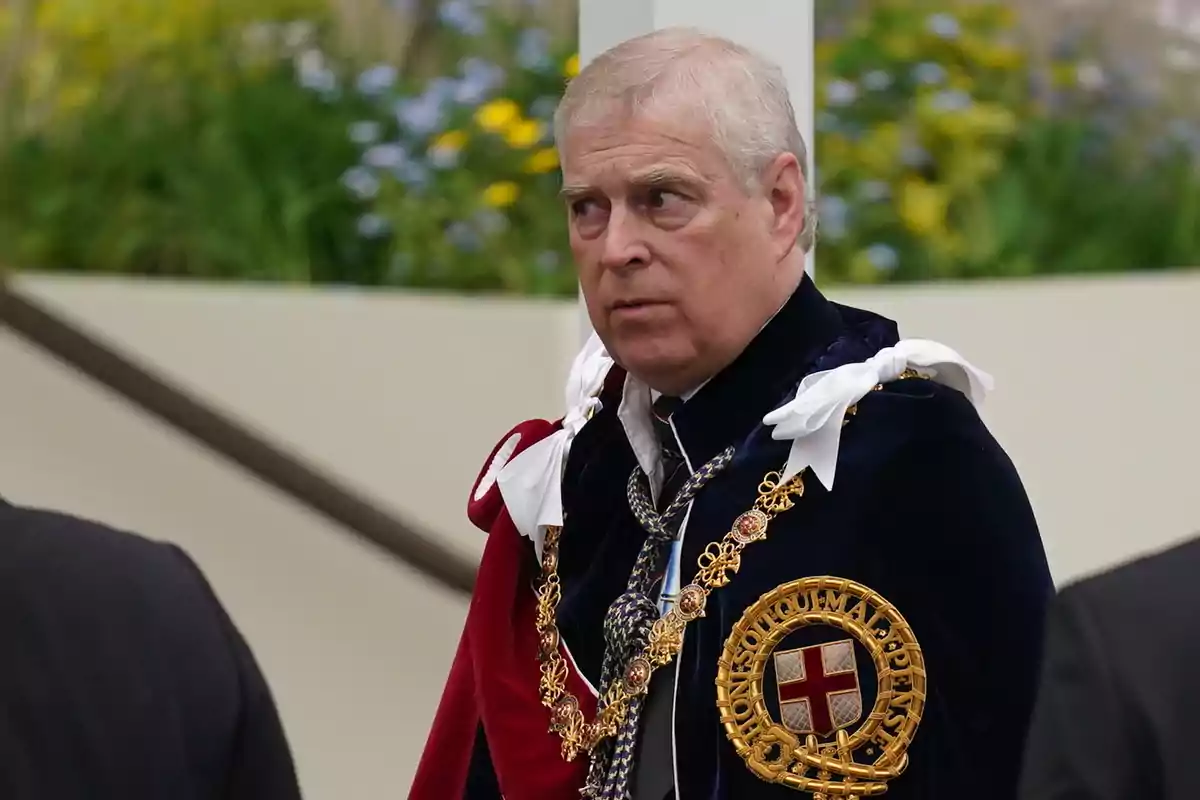 Prince Andrew in formal attire and gold embellishments at an outdoor event. Prince Andrew in formal attire and gold embellishments at an outdoor event.